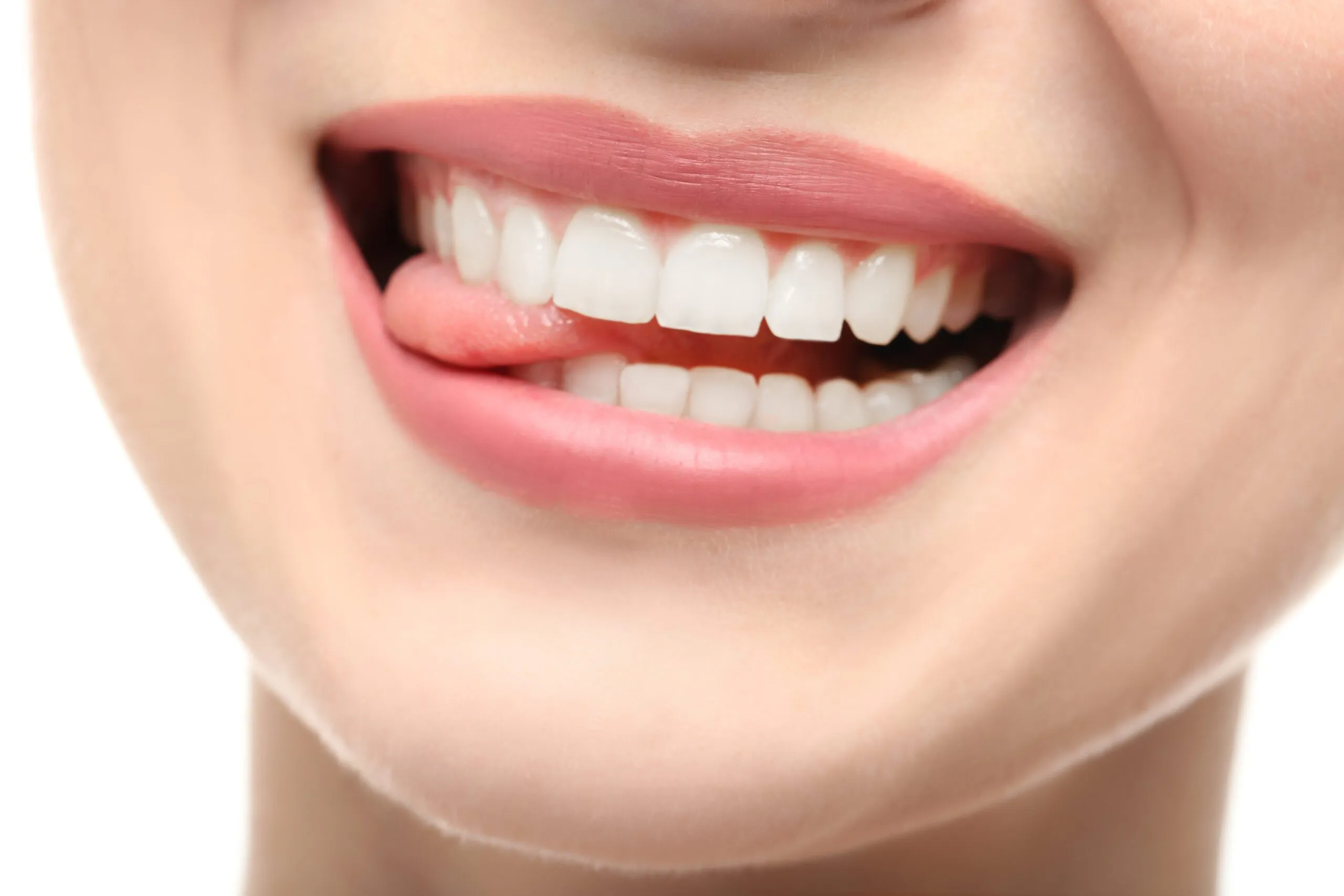 Beautiful young woman with healthy teeth for the dentist in Rheinfelden
